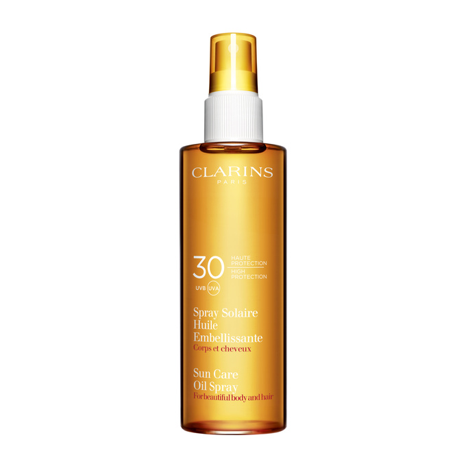 Солнцезащитное масло-спрей Sun Care Oil Spray SPF 30, Clarins, подходит и для волос, и для тела. Оптимально для тех, кто не любит обилия тюбиков в пляжной сумке.