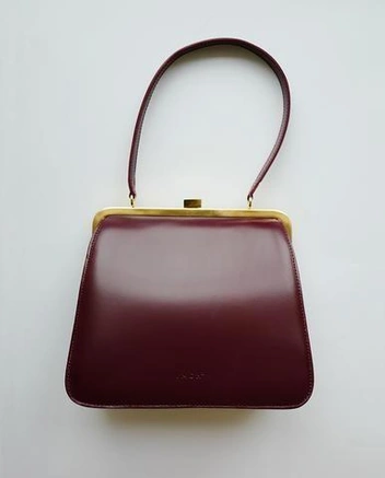 Винтажная сумка наверняка найдется в шкафу у мамы или бабушки  | Источник: ru.pinterest.com