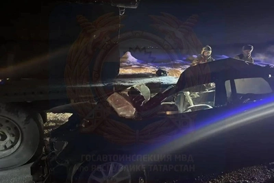 Car crashes under truck on M-7, driver killed