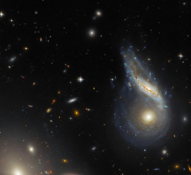 Почему галактики имеют дискообразную форму?