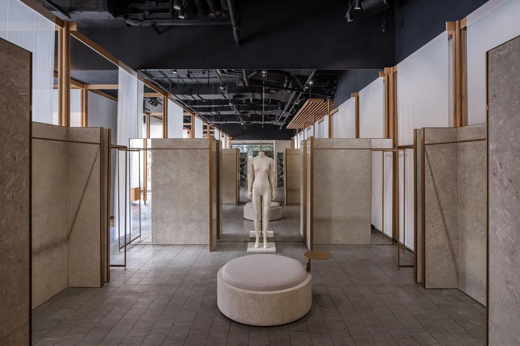Новый бутик по проекту Neri & Hu в Шанхае — с перегородками из мрамора и ткани