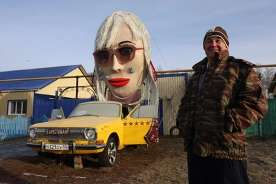 He wings it: Pensioner mounts giant Natali head on vintage Volga