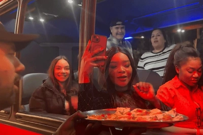 Rappers turn bus into stage during Grammy tour party