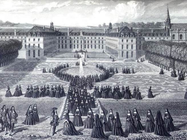 Воспитательный дом в Сен-Сире был открыт в 1686 году. Для этого был создан специальный монашеский орден — «институт дам св. Людовика». Члены ордена давали не только обеты бедности, целомудрия и послушания, но и обет посвятить свою жизнь воспитанию детей. В 1692 году «институт» был преобразован в монастырь св. Августина. С этого момента весь уклад жизни в Воспитательном доме стал основываться не только на труде и дисциплине, но и на строгой религиозности | Источник: Wikimedia Commons