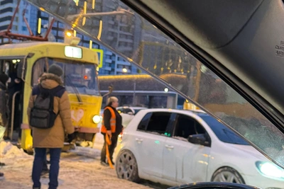 Tram Drags Car Stuck on Rails in Akademichesky