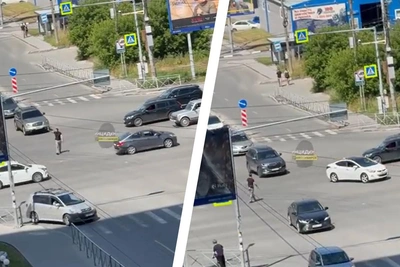 Житель Новосибирска встал регулировать движение на сломанном перекрестке