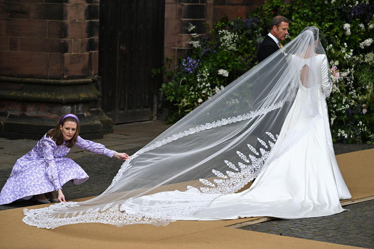 Двухметровый шлейф и бриллиантовая тиара: как выглядела самая красивая невеста Британии — все детали свадебного образа Оливии Хенсон