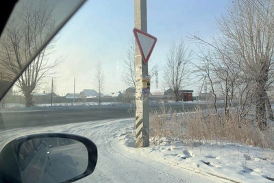 No Traffic Light, Left Turn Ban: Solving Exit Problem in Chita Microdistrict