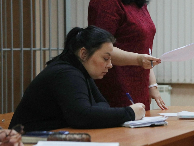 Людмила Троянова, по данным следствия, представлялась юристом или бухгалтером ТСН «Восход». | Источник: Андрей Бортко / NGS.RU