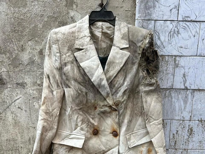 Пожар почти не повредил белый китель | Источник: Нина Нагорнева