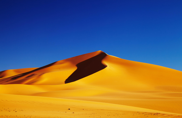 Почему не рассыпаются песчаные дюны?