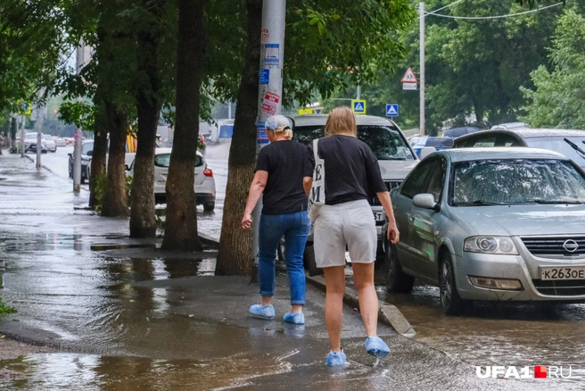 А кто-то подготовился к непогоде | Источник: Булат Салихов