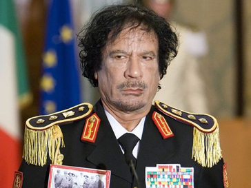 Муамара Каддафи (Muammar Kaddafi) пообещал разобраться с повстанцами.