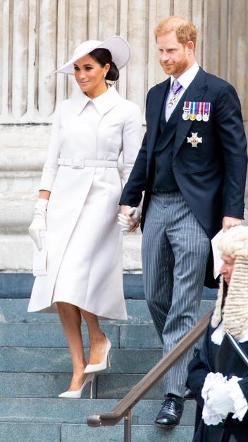 Герцогиня Меган и принц Гарри после службы в честь Платинового юбилея правления Елизаветы II, Лондон, 3 июня 2022