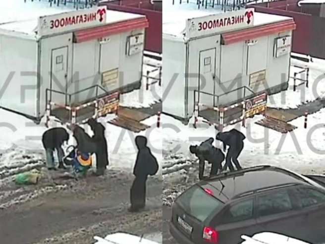 Выбраться из люка людям помогли прохожие | Источник: Мурманск сейчас / Telegram