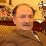 <p><span>Али Эрказан</span></p>