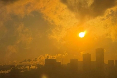 Fiery Dawn Over Moscow as Grey Sky Turns Yellow