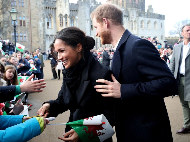Меган Маркл и принц Гарри во время визита в Кардифф, 18 января 2018