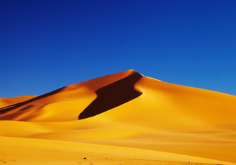Почему не рассыпаются песчаные дюны?