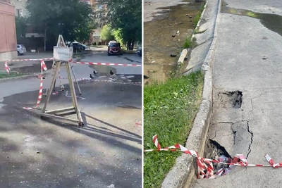 На Лежена прорвало трубу: асфальт подмыло, подвал топит