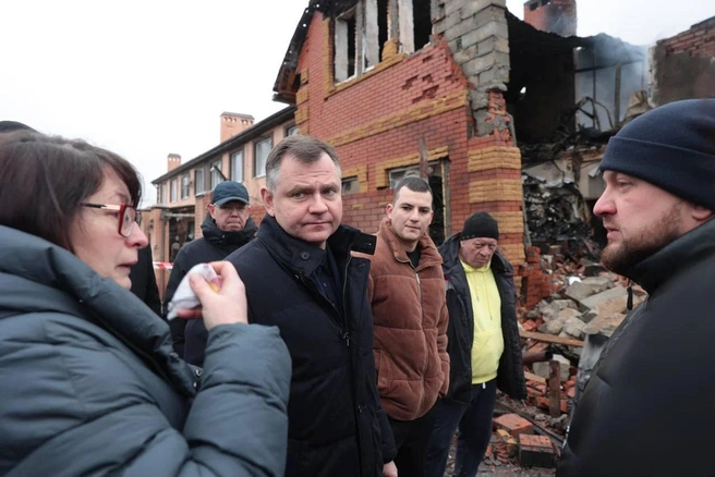 Юрий Слюсарь и близкие погибшей | Источник: Юрий Слюсарь / Telegram