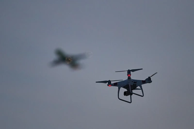 Drones strike Krasnodar port, causing fatalities and oil depot fire