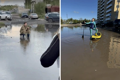 Учителя из Архангельска рыбачат в луже у школы