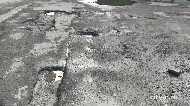 Крупный план дорожного покрытия | Источник: www.city-n.ru