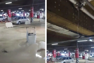 Парковку «Меги» в Омске залило водой, образовался лёд