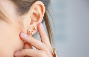 Шишка на мочке уха: причины появления и способы удаления
