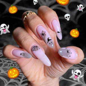 7 модных маникюров с пауками, призраками и тыквами на Хэллоуин 2025