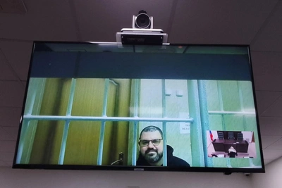 Суд оставил под стражей журналиста Смирнова