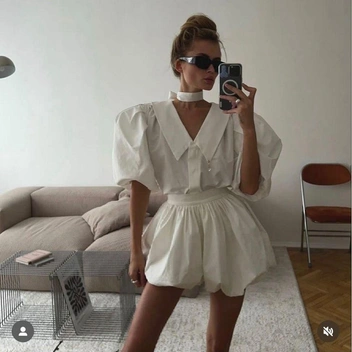 Обратите внимание, как роскошно смотрится блуза в стиле 80-х | Источник: ru.pinterest.com