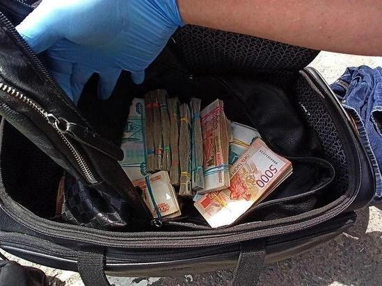 Похищенные 13 миллионов рублей преступники распределили по нескольким сумкам | Источник: ГУ МВД России по Волгоградской области