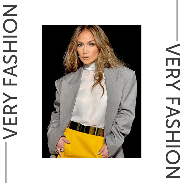 Горчичная юбка + серый пиджак — формула нарядного и стильного образа от Дженнифер Лопес