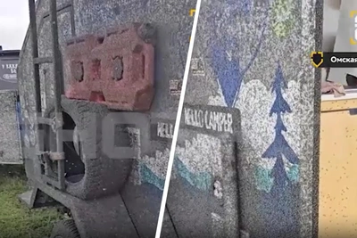 Омские комары облепили внедорожник и автодом