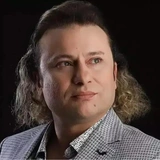 <p>Онур Акай</p>