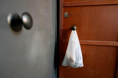 Stroke survivor without passport struggles in trash-filled flat