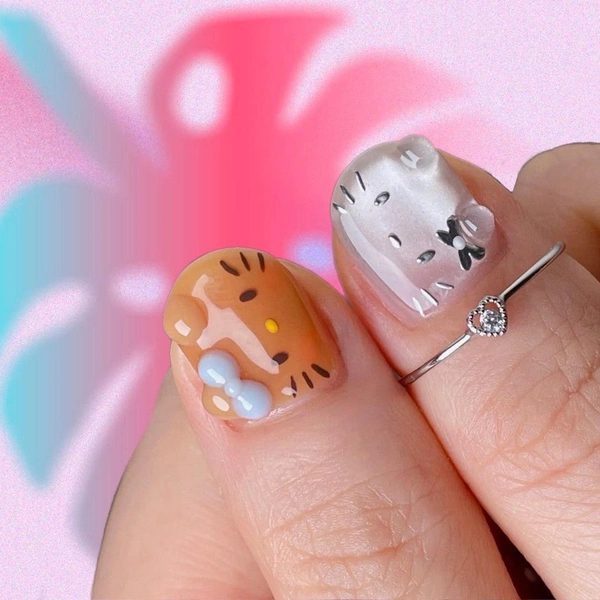Ставим лайк: 6 стильных и нежных маникюров с Hello Kitty | Источник: theGirl