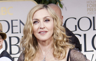 Кружевное белье и ничего лишнего: откровенный наряд 65-летней Мадонны потряс публику