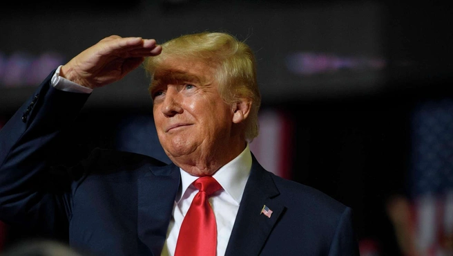 Трамп по-прежнему смотрит в будущее с оптимизмом | Источник: JEFF SWENSEN / AFP