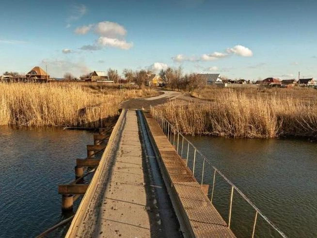 Жители уверены в безопасности моста | Источник: Яндекс Карты