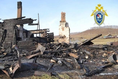 Mother to be tried for deaths of three sons in fire