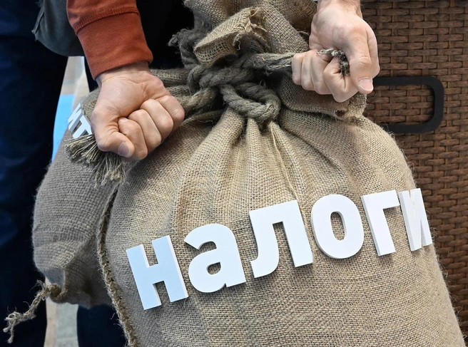 Плюс НДС минус льготы. Кому можно будет сэкономить пару триллионов | Источник: Анатолий Жданов / «Коммерсантъ»