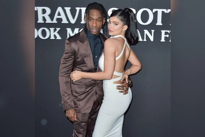 Travis Scott Distracts Timothy Chalamet by Singing About Kylie Jenner's Implants