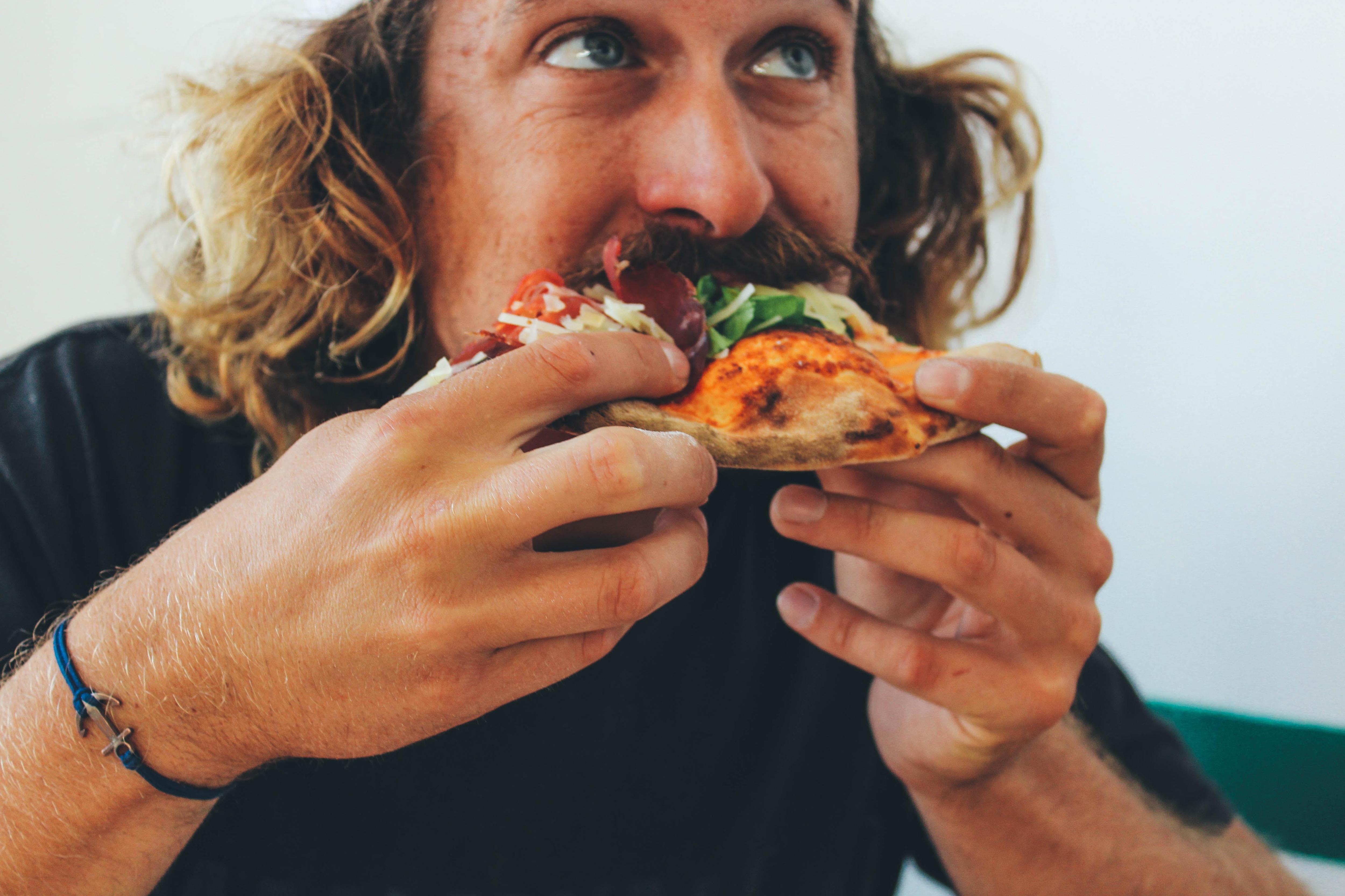 If you eat too many. Человек ест. Люди едят в ресторане. Человек ест фото. Люди едят пиццу.