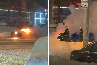 На улице Фрунзе в Новосибирске загорелся автомобиль