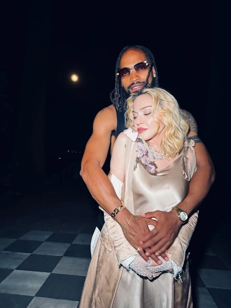 Мадонна и Аким Моррис