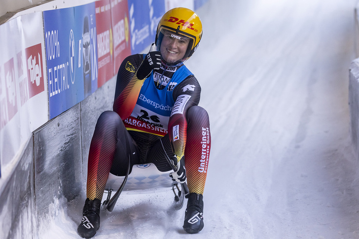 Third place finischer Natalie Geisenberger of Germany reacts after crossing the finish line of the Women's Single race during the FIL Luge World Cup at Olympia-Eiskanal Igls on December 19, 2021 in Innsbruck, Austria.