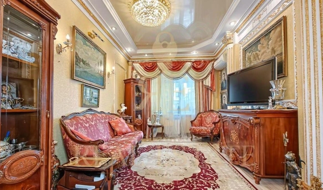 В квартире много красного оттенка  | Источник: Real Estate / N1
